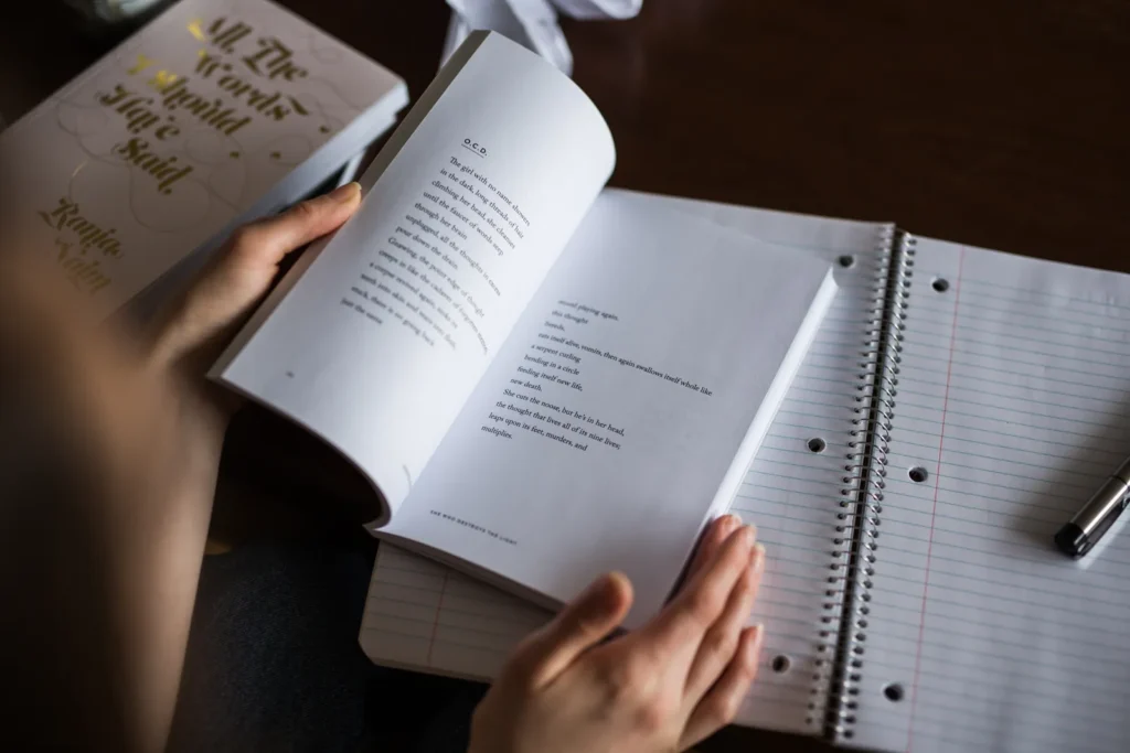 A person reading an open book