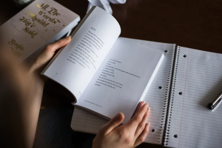A person reading an open book