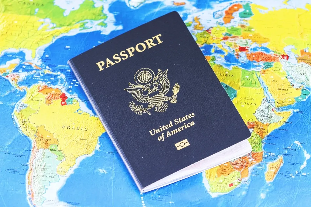 A passport resting on a world map