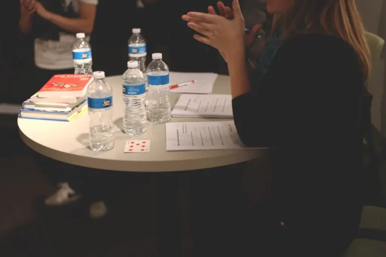 Two people having a discussion at a table
